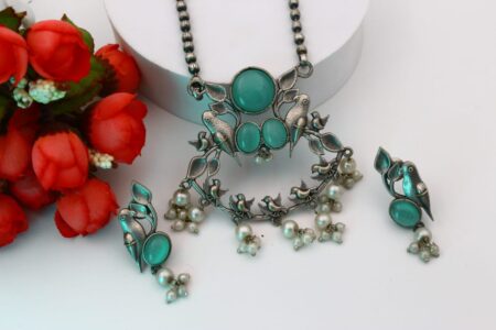 Parrot and Sparrow Sitting on The Garden of Flowers With The Beautiful Pearl Beads